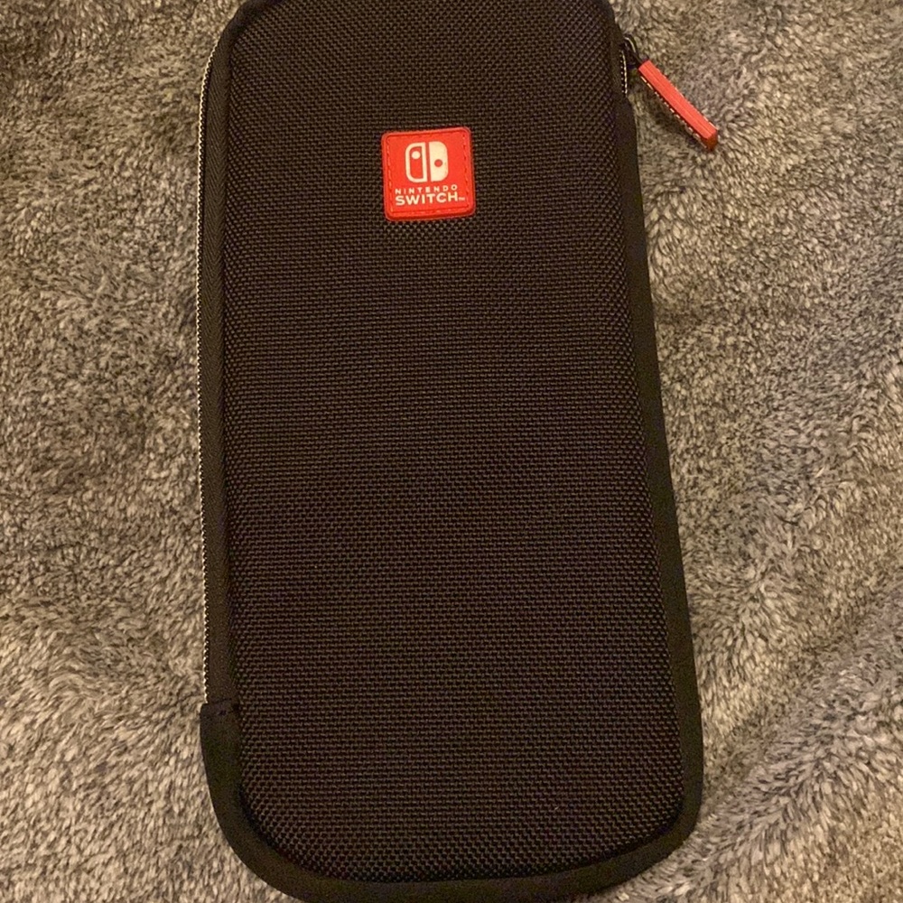 Nintendo switch case, first both sizes of switch. Very soft inside. Zipper case.